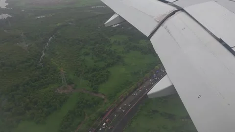 A view of mangroves through the window of an airline while landing on Mumba.. Stock-Footage 283573251
