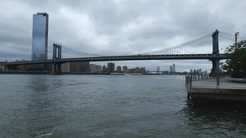 A view of the Manhattan Bridge under overcast sky. Stock Footage 310624015