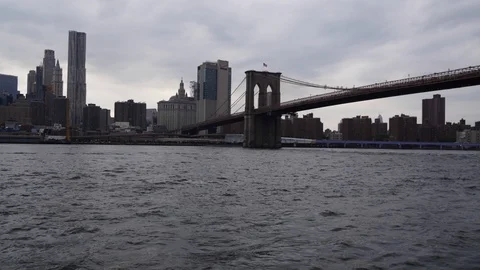 View of Manhattan skyline from Brooklyn bridge waterfront. Time lapse. Stock Footage 101387278