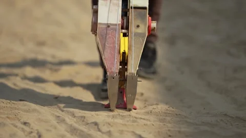 View of a manual seed planter tool being used in sandy soil, Nepal. Video stock 335475784