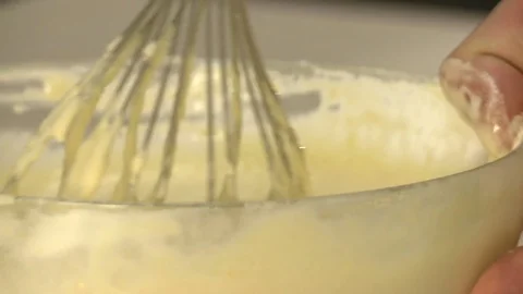 View of manual stirring dough for dessert Stock Footage