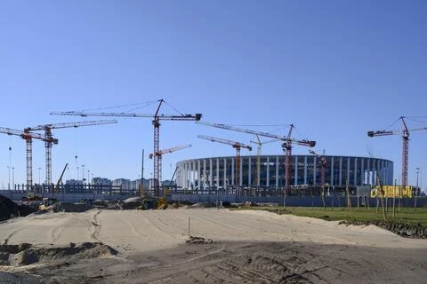 View of the many cranes on the construction of a modern building Stock Photos