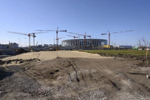 View of the many cranes on the construction of a modern building Stock Photos