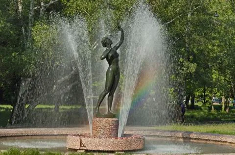 View of many fountain with different programme and rainbow  in the public  park Stock Photos