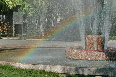 View of many fountain with different programme and rainbow  in the public park Stock Photos