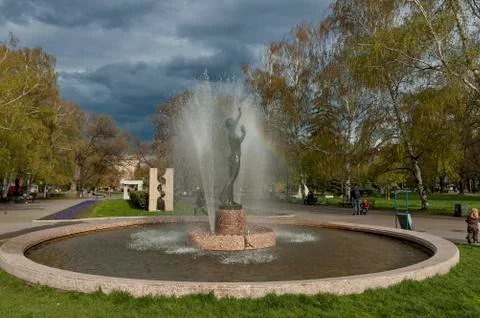 View of many fountain with different programme and rainbow  in the public  park Stock Photos