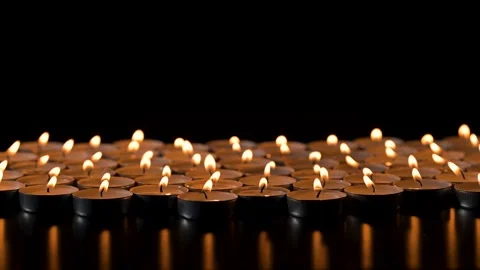View of many small candles burning Stockbeeldmateriaal 335149916
