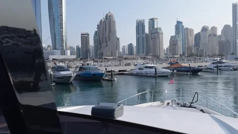 View of the marina with yachts with the Dubai in the background. View from a Stock Footage 278573905