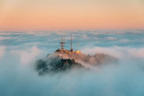View of marine layer low clouds over Los Angeles at sunset, from Mount Wilson Stock Photos