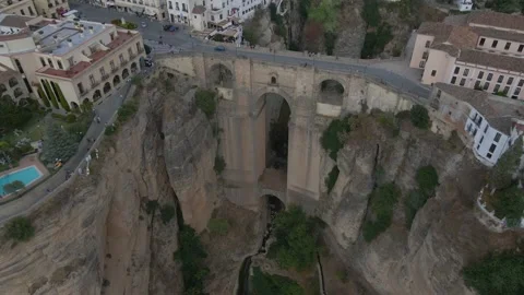 View of the massive bridge between two huge cliffs in Ronda, architecture, 4k Stock Footage 164858574