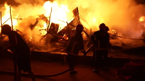View of a massive fire at night in Khagrachari, Bangladesh. Video stock 335562160