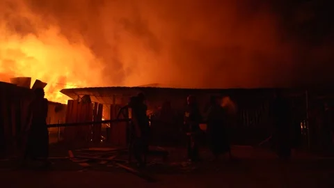 View of a massive fire at night in Khagrachari, Bangladesh. Video stock 335562419