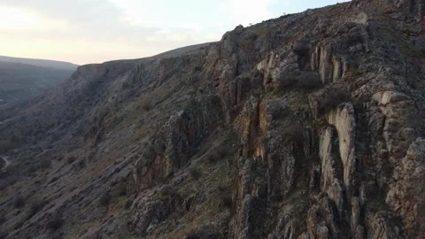 View of massive vertical geological rock fins on mountainside in Kazakhstan Stock Footage 337455218