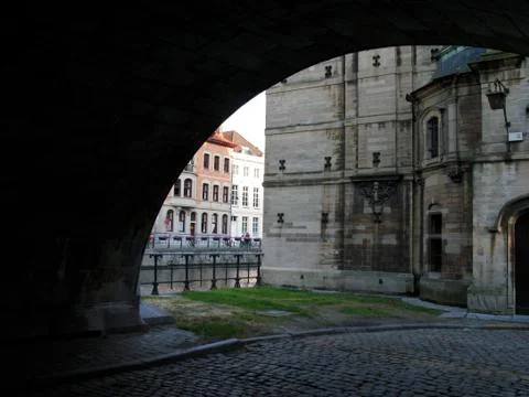 View of Medieval Building through the Arch in Ghent Stock Photos