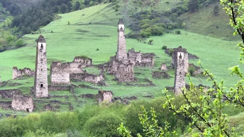 View of the medieval Targim tower complex in the Caucasus mountains  Stock Footage 255997686