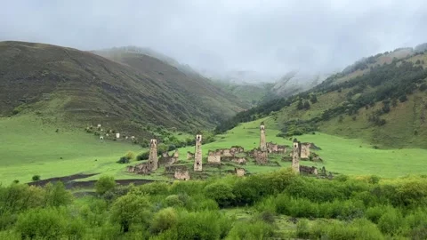 View of the medieval Targim tower complex in the Caucasus mountains  Stock Footage 255998302