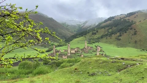 View of the medieval Targim tower complex in the Caucasus mountains  Stock Footage 265978957