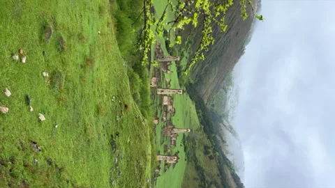View of the medieval Targim tower complex in the Caucasus mountains  Stock Footage 265980793