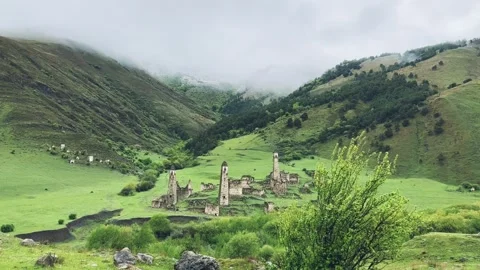 View of the medieval Targim tower complex in the Caucasus mountains  Stock Footage 266293708