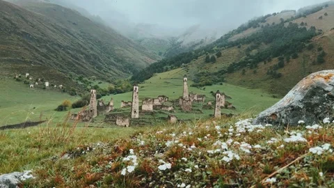 View of the medieval Targim tower complex in the Caucasus mountains  Stock Footage 266294357