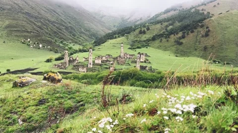 View of the medieval Targim tower complex in the Caucasus mountains Stock Footage 266294928