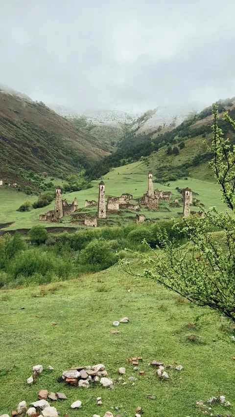 View of the medieval Targim tower complex in the Caucasus mountains Stock Footage 271148719