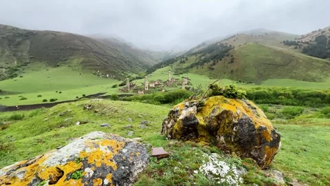 View of the medieval Targim tower complex in the Caucasus mountains Stock Footage 271149622