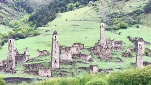View of the medieval Targim tower complex in the Caucasus mountains Stock Footage 271150236