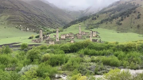 View of the medieval Targim tower complex in the Caucasus mountains Stock Footage 271150889
