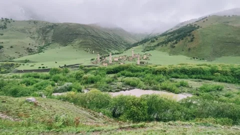 View of the medieval Targim tower complex in the Caucasus mountains Stock Footage 271151057