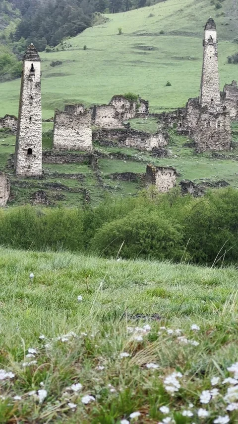 View of the medieval Targim tower complex in the Caucasus mountains Stock Footage 271151220
