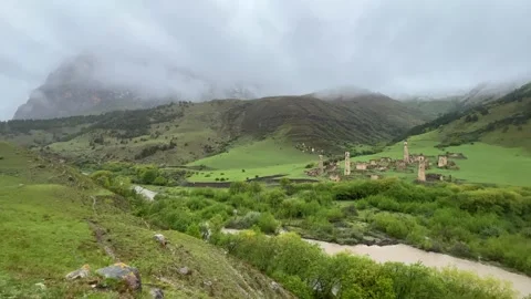 View of the medieval Targim tower complex in the Caucasus mountains Stock Footage 272506504