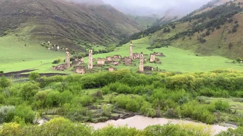 View of the medieval Targim tower complex in the Caucasus mountains Stock Footage 272508438