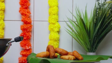 View of medu vada being served during Diwali festivities, India. Stock Footage 343685349