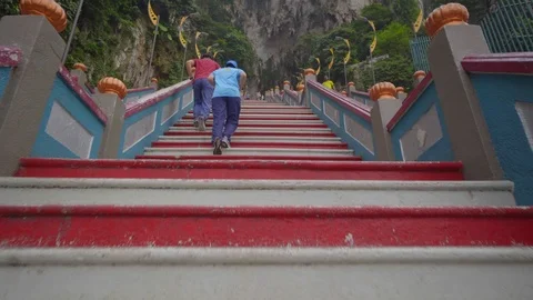 View of men foot climbing the steps leading to Batu Caves in kuala lumpur Stock Footage 111278119