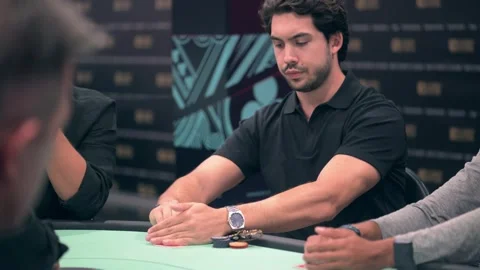 View of men playing poker at a table in Casino Estoril, Portugal. Video stock 343877919