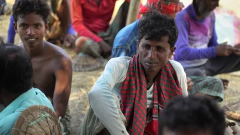 View of men sitting together in Natore, Bangladesh. 스톡 동영상 335557883