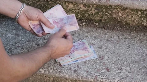 View of men's hands, a man counts Georgian money Stock Footage 219719877