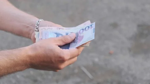 View of men's hands, a man counts Georgian money Stock Footage 219720189