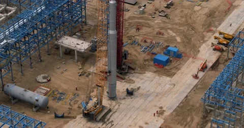 View of the metal structures of a large factory from a drone Stock Footage 138255582