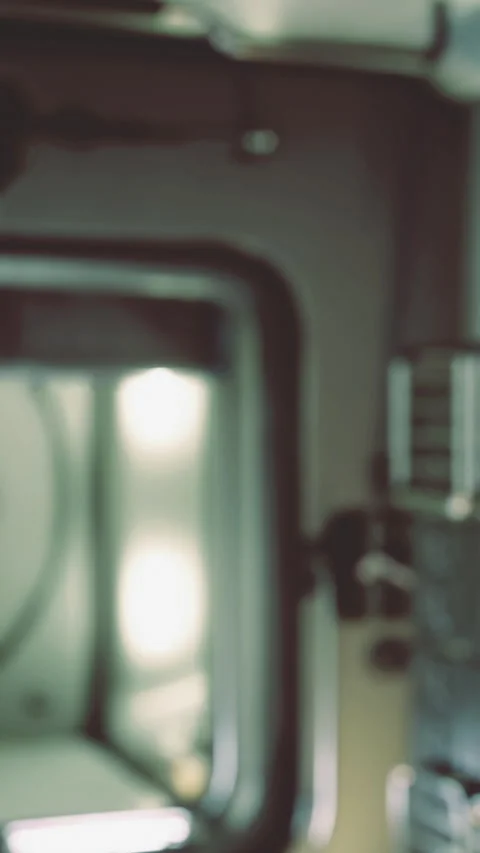 View of a metallic device with light reflections from a room Stock Footage 334263768