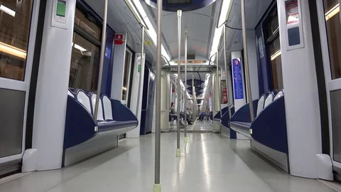 View of metro train indoor passenger people commute in Madrid commuter seat down Stock Footage 81979253