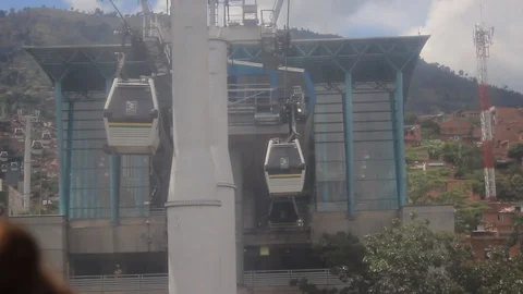 View of the metrocable transport system working from inside a cabin Stock Footage 91554904