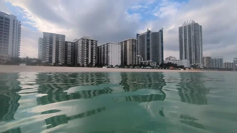 View of Miami Beach from the water with surface reflection Stock Footage 293229702