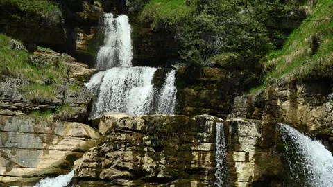 View on the middle part of a threefold waterfall Stock-Footage 260813928