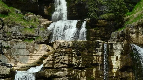 View on the middle part of a threefold waterfall Stock-Footage 260813929