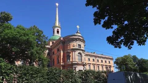 View of the Mikhailovsky Castle and its tower against bright blue sky. Stock Footage 299790056