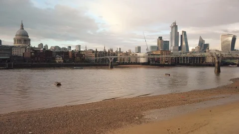 View to Millennium Bridge and Saint Paul's Cathedral from Thames embankment. Stock Footage 113394330