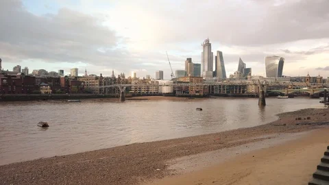 View to Millennium Bridge and Saint Paul's Cathedral from Thames embankment. Stock Footage 113394549