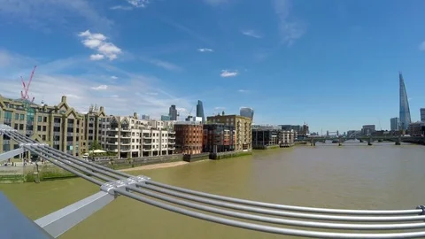 View from Millennium Bridge towards The Shard and Tower Bridge on a beautiful Stock Footage 79500712